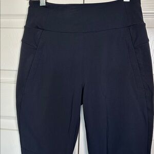 Athleta Navy Highland Hybrid Ankle Tight with four pockets, size 2